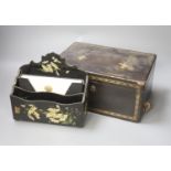 A chinoiserie lacquered caddy with internal liner and a lacquered letter rack (2)