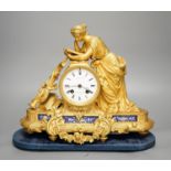 A French ormolu and porcelain mounted figural mantel clock 35cm