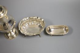 A Continental white metal caster, 21.7cm, an 800 standard silver bowl and a large silver salt, 12.