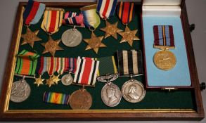 A George VI Efficiency medal to 885238 SJT. R. .BURRIDGE .R.A. various unnamed WW2 medals and