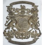 A 'Purveyors of Tea' armorial brass plaque, height 39cm