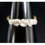 An 18ct, plat and graduated five stone diamond set half hoop ring, size N, gross 3.1 grams.