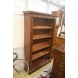 A large late Victorian mahogany open bookcase, length 118cm, depth 36cm, height 187cm