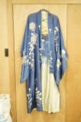 A Japanese embroidered silk kimono and a brocade obi