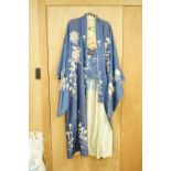 A Japanese embroidered silk kimono and a brocade obi