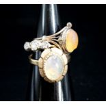 A yellow metal and illusion set three stone diamond ring, size P and two other yellow metal and