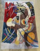 A contemporary Picasso inspired polychrome abstract pattern rug, 246 x 160cm