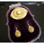 A Victorian yellow metal navette shaped brooch, with bead decoration, 46mm and a pair of similar