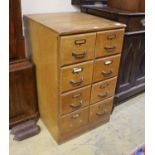 An early 20th century oak eight drawer small filing chest, width 54cm, depth 63cm, height 92cm