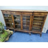 A Queen Anne revival walnut dwarf breakfront bookcase, length 182cm, depth 38cm, height 113cm