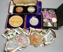 A group of UK coins and medallions, some silver issues