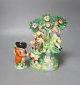 A Staffordshire figure group and character jug 21cm