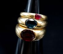 Two 18ct and gypsy set gem set rings, maker TR, size M and a similar smaller ring, size H, gross