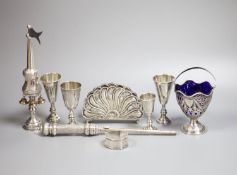 Four George V silver kiddush cups, largest 10.9cm, two other Judaic items, a 925 letter rack, silver