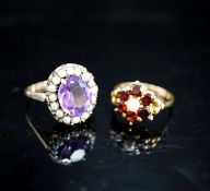 A 9ct garnet and cultured pearl ring and a 9ct gold amethyst and seed pearl mounted ring, gross 9.