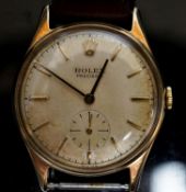 A gentleman's late 1950's 9ct gold Rolex Precision, manual wind wrist watch, on associated leather