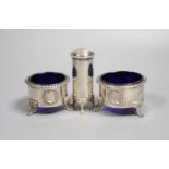 A modern three piece silver condiment set by Christopher Nigel Lawrence, London, 1986, pepper