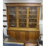 An Edwardian pale oak library bookcase by Robson and Sons of Newcastle, width 190cm, depth 45cm,