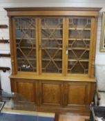 An Edwardian pale oak library bookcase by Robson and Sons of Newcastle, width 190cm, depth 45cm,