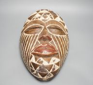 An African tribal mask, height 36cm