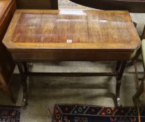 A Regency Kingwood folding card table, banded and brass line inlaid, width 89cm, depth 44cm,