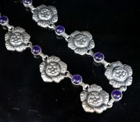 A Georg Jensen sterling flower head and cabochon amethyst link necklace, set with twelve stones. no.