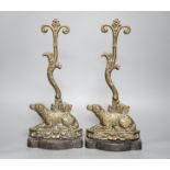 Two matching Victorian cast brass ‘spaniel’ door stops.