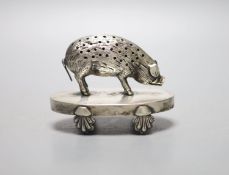 A continental white metal novelty oval toothpick holder, modelled as a pig on an oval base, 91mm,