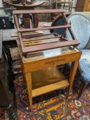 A 20th century two-tier table with scumbled finish, width 51cm, depth 51cm, height 68cm together