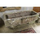 A 19th century carved stone bow fronted trough, length 133cm, depth 57cm, height 54cm