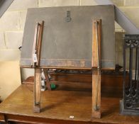 An early 20th century brass mounted folio stand together with a reading lamp