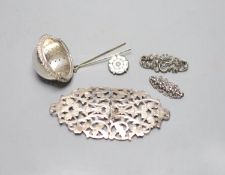 An Edwardian pierced silver belt buckle, Birmingham, 1901, 11.2cm, two brooches , rose brooch and