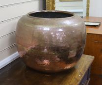 A large planished copper jardiniere 36cm