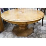 An Art Deco burr walnut circular low table with figured segmented veneered top, diameter 120cm,