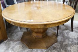 An Art Deco burr walnut circular low table with figured segmented veneered top, diameter 120cm,
