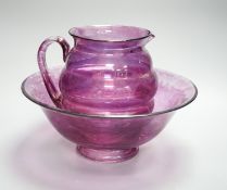 An amethyst flashed glass basin and jug.