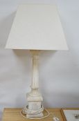 An alabaster desk lamp with shade