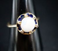 An 18ct, blue enamel, diamond chip and opal set dress ring, size R, gross weight 4.3 grams.