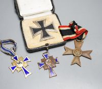 WWII Third Reich medals to include a Cross of Honour of the German Mother in gilt, another damaged