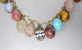 A 9ct gold and egg shaped specimen hardstone and enamelled charm set necklace, 70cm, gross weight