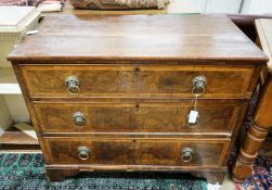 A walnut and oak chest of drawers, width 103cm, depth 52cm, height 82cm