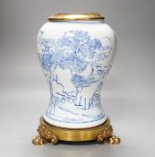 A Chinese blue and white baluster vase, brass mounted 29cm