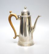 A modern 18th century style silver coffee pot, Nayler Brothers, London, 1981, height 21.4cm, gross