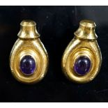 Attributed to Ilias Lalaounis, a pair of planished 750 yellow metal and cabochon amethyst set