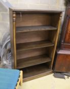 A reproduction Victorian style mahogany open fronted bookcase, length 82cm, depth 30cm, height