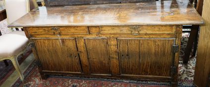 An 18th century and later oak low dresser, length 182cm, depth 52cm, height 75cm