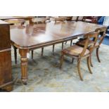 A late Victorian walnut wind-action dining table with two extra leaves, no winder, 236cm extended,