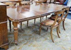 A late Victorian walnut wind-action dining table with two extra leaves, no winder, 236cm extended,