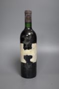 One bottle of Chateau Margaux, label very bleached and torn, year unknown.