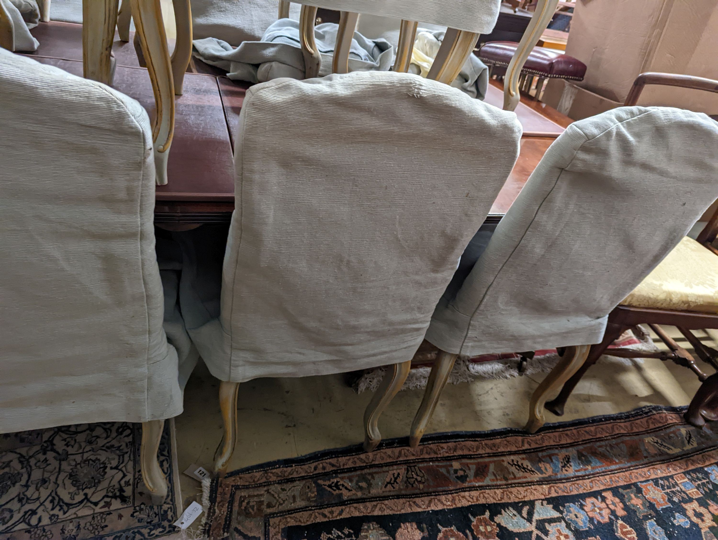 A set of fourteen French Louis XV style painted upholstered dining chairs with loose covers - Image 7 of 9